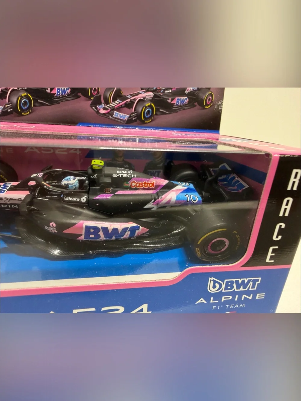 Bburago A524 BWT Alpine F1 Team Diecast Car - Pink & Blue with driver